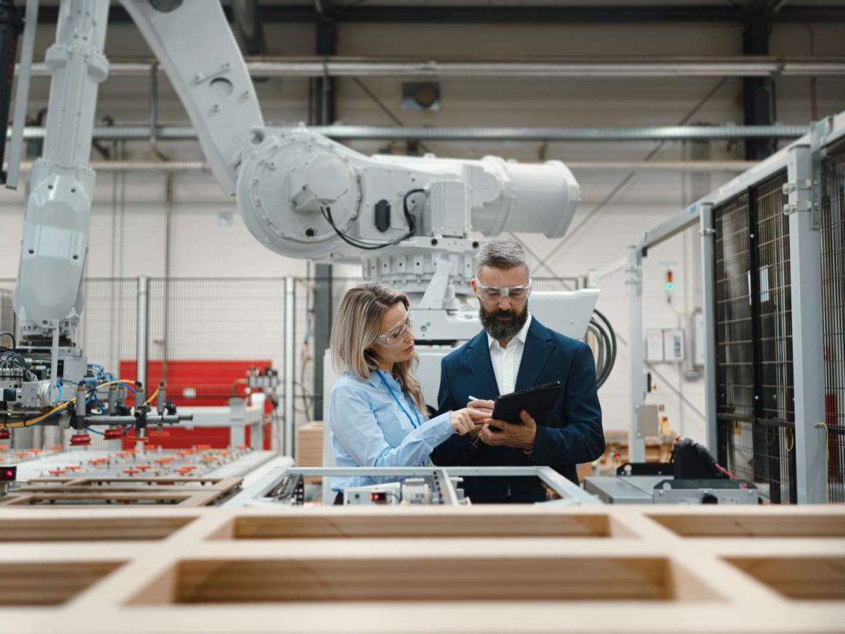 Female,Engineer,And,Male,Project,Manager,Standing,In,Modern,Industrial